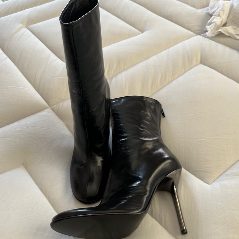 Mid calf, high heeled booties.